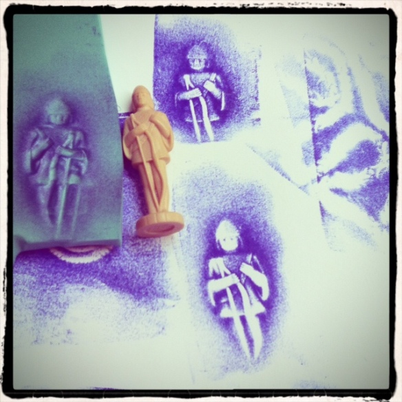A tiny game piece makes a haunting print.  Even the inked stamp (blue foam on the right) forms an interesting, 3D image.